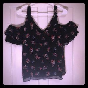 Floral tank top with drape sleeve.